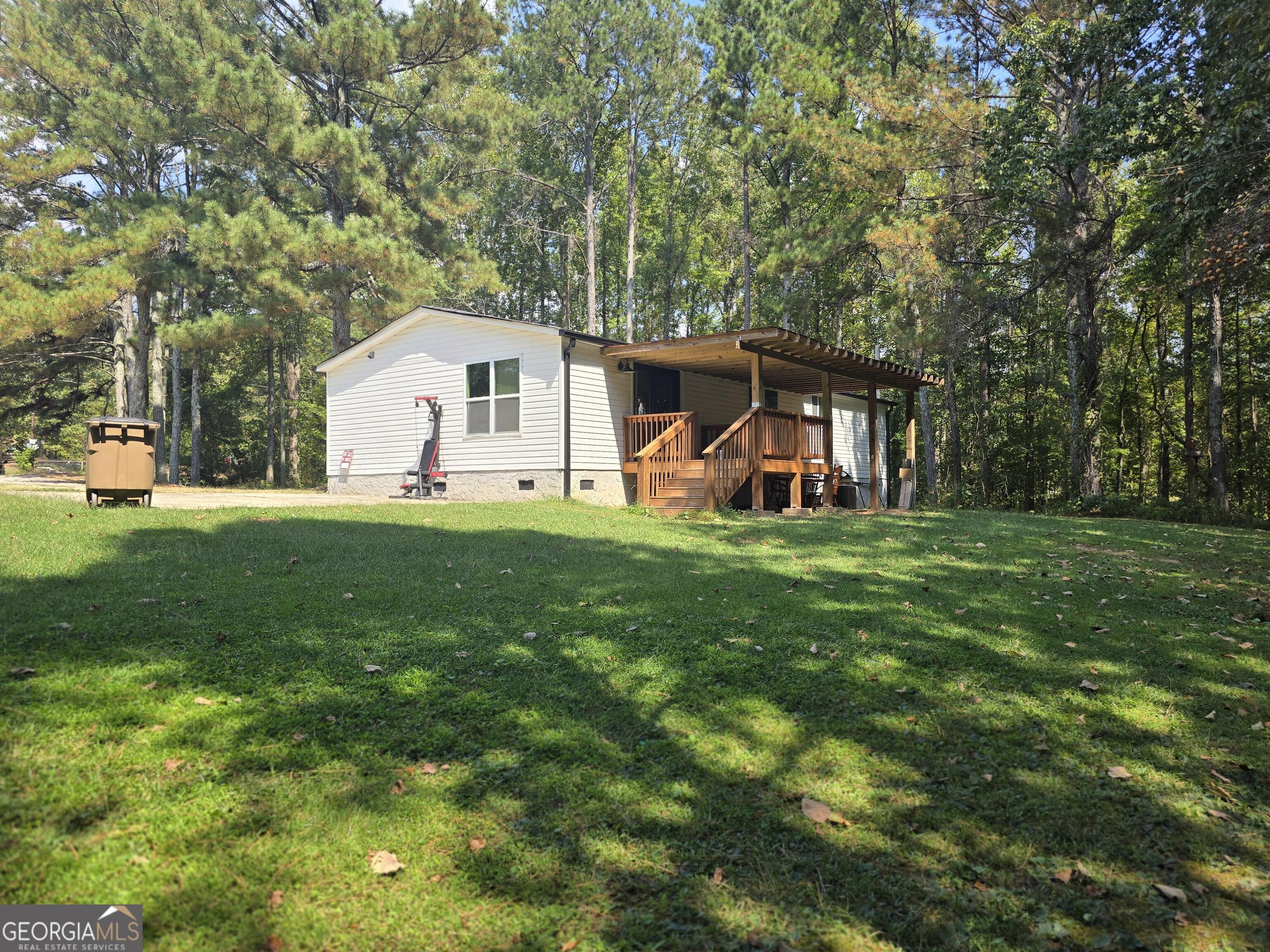 1109 Liberty Church Road Bremen, GA 30110 - Photo 5 of 26 a front view of house with yard and green space