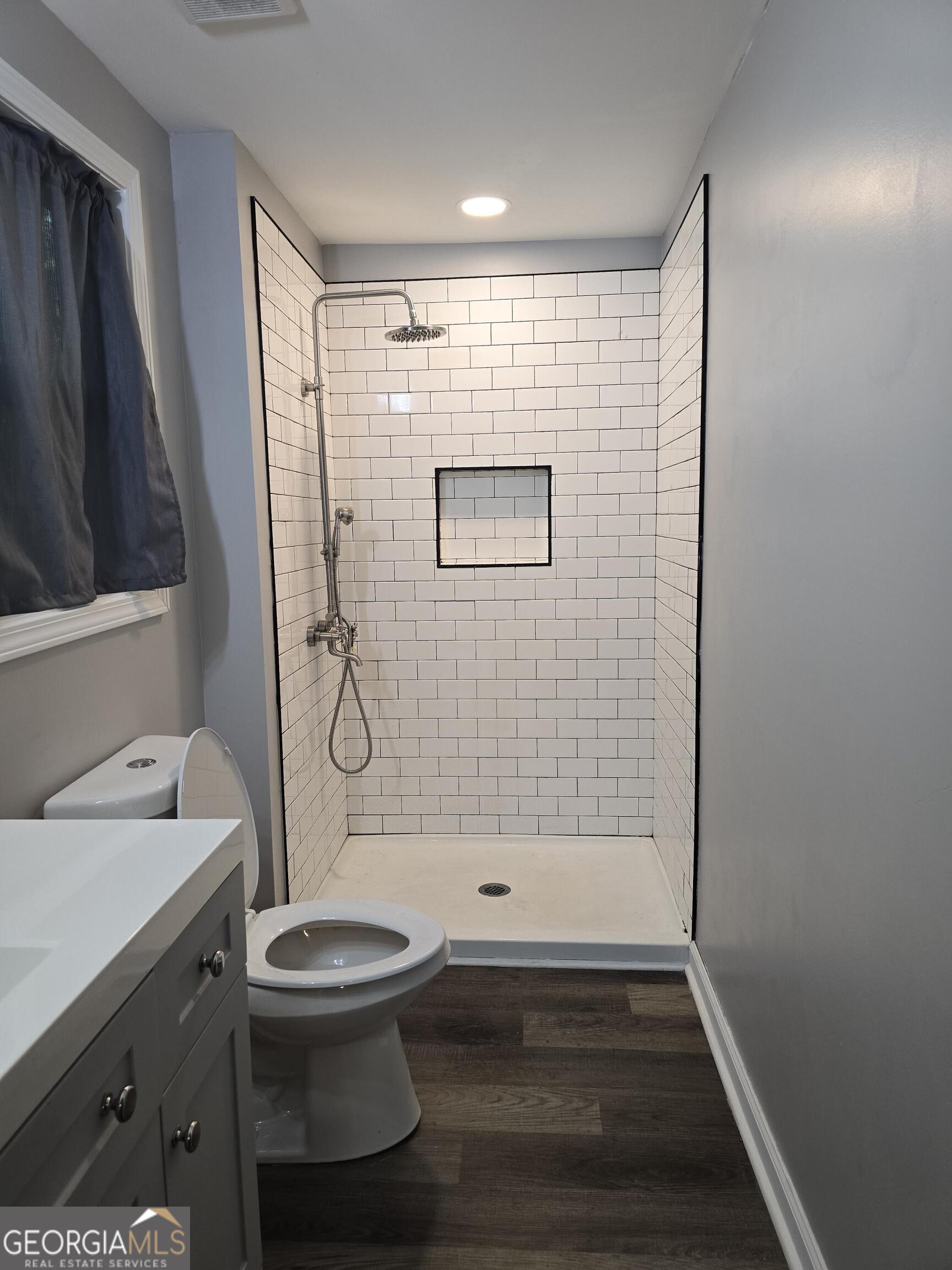 1109 Liberty Church Road Bremen, GA 30110 - Photo 6 of 26 a bathroom with a toilet and a shower