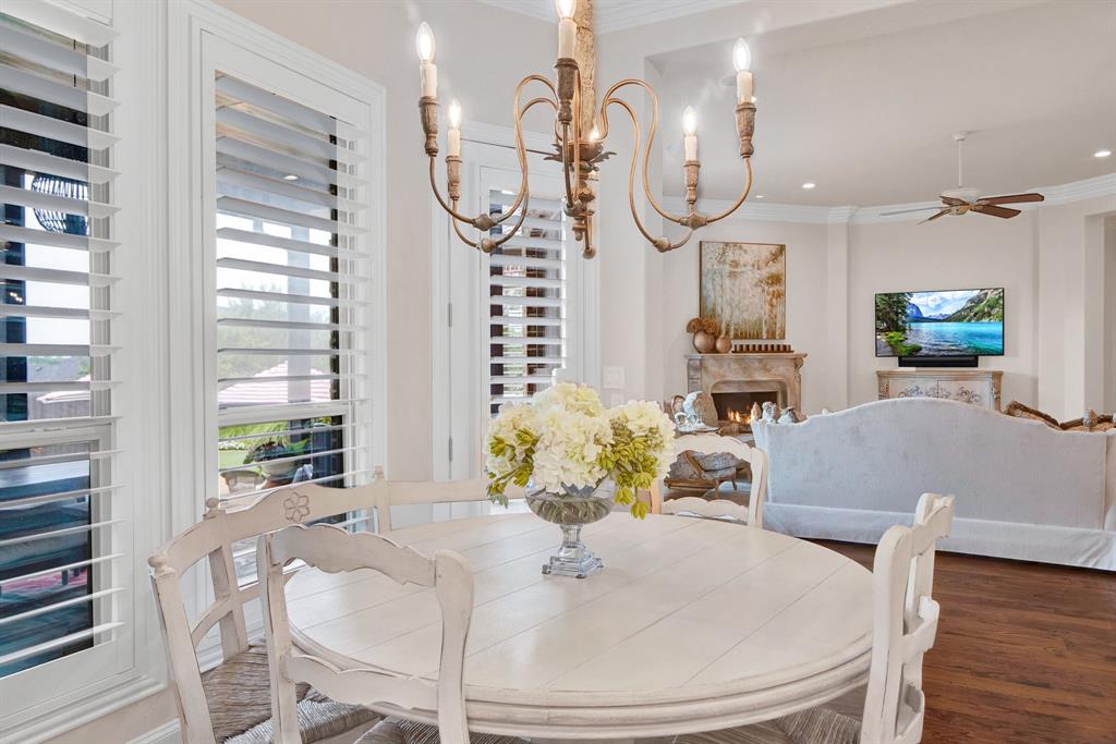 2921 Sedalia Trail Sherman, TX 75092 - Photo 15 of 40 a dining room with furniture a large window and wooden floor