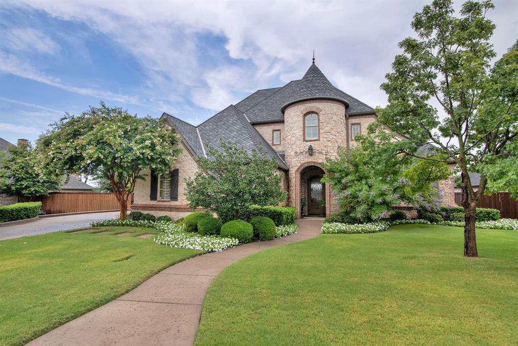 2921 Sedalia Trail Sherman, TX 75092 - Photo 2 of 40 a front view of a house with garden