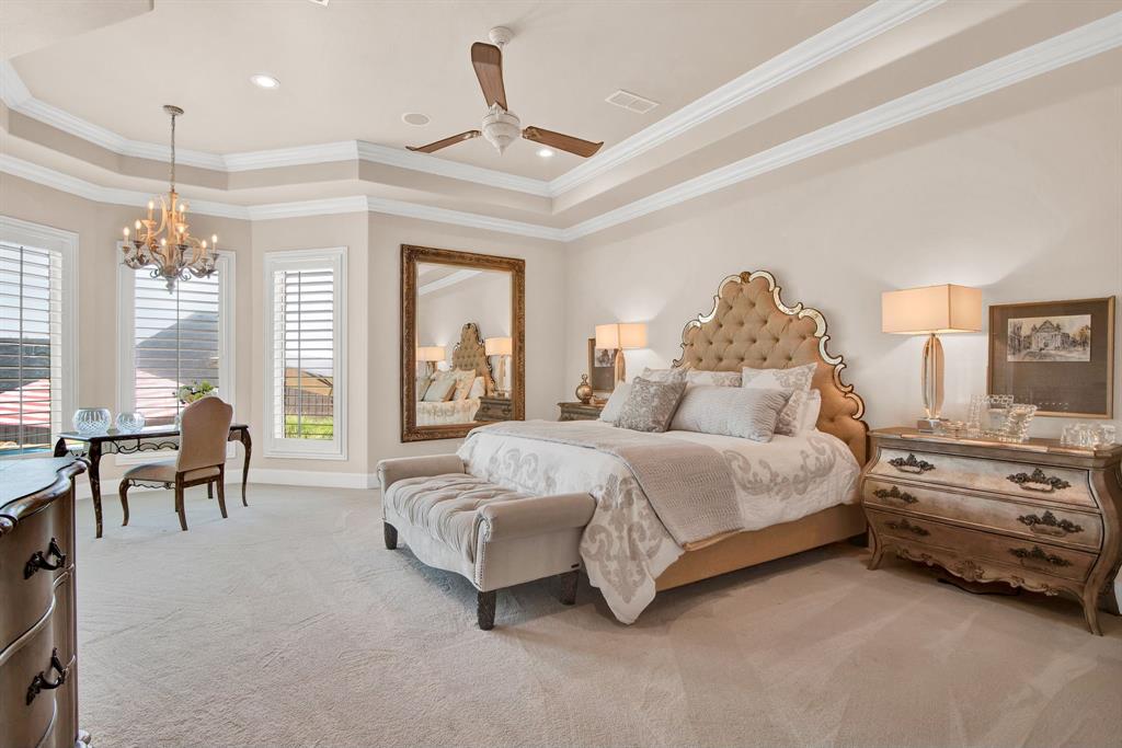 2921 Sedalia Trail Sherman, TX 75092 - Photo 22 of 40 a spacious bedroom with a bed and a large window