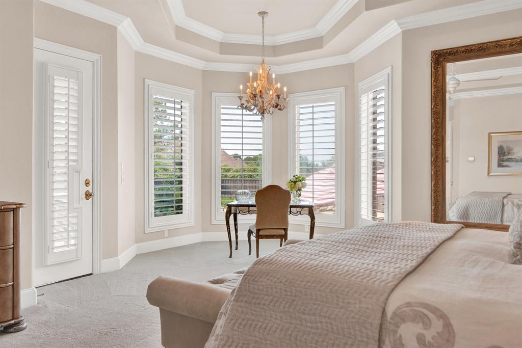 2921 Sedalia Trail Sherman, TX 75092 - Photo 23 of 40 a bedroom with a bed and windows