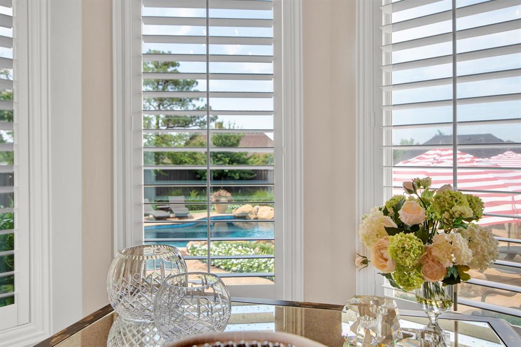 2921 Sedalia Trail Sherman, TX 75092 - Photo 24 of 40 a vase of flowers sitting on a table with window