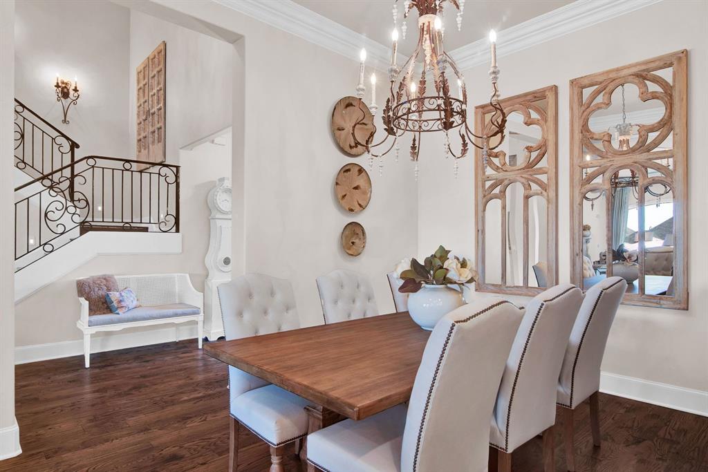 2921 Sedalia Trail Sherman, TX 75092 - Photo 7 of 40 a view of a dining room with furniture wooden floor and a chandelier