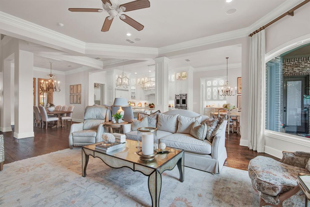 2921 Sedalia Trail Sherman, TX 75092 - Photo 9 of 40 a living room with furniture a table and a chandelier