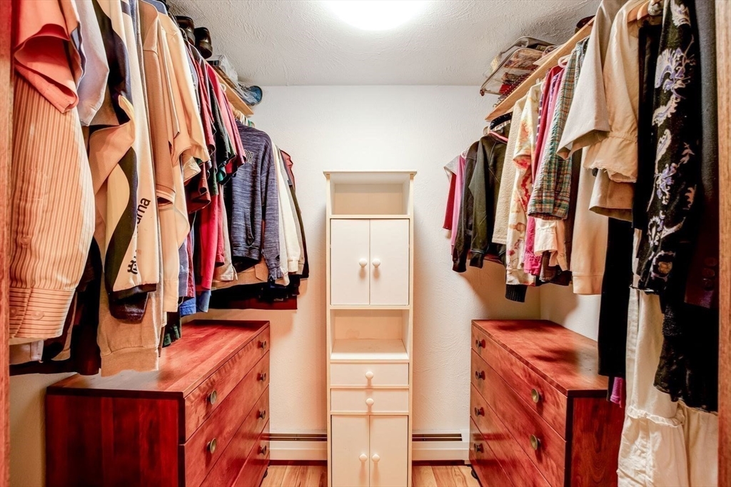 205 East Rindge Road Ashburnham, MA 01430 - Photo 34 of 40 a view of walk in closet with clothes and shoes