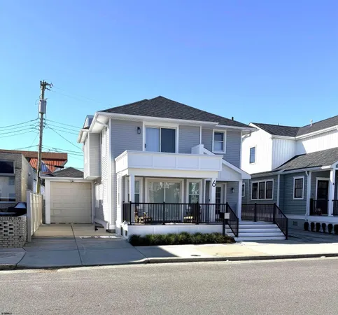 a front view of a house with a porch