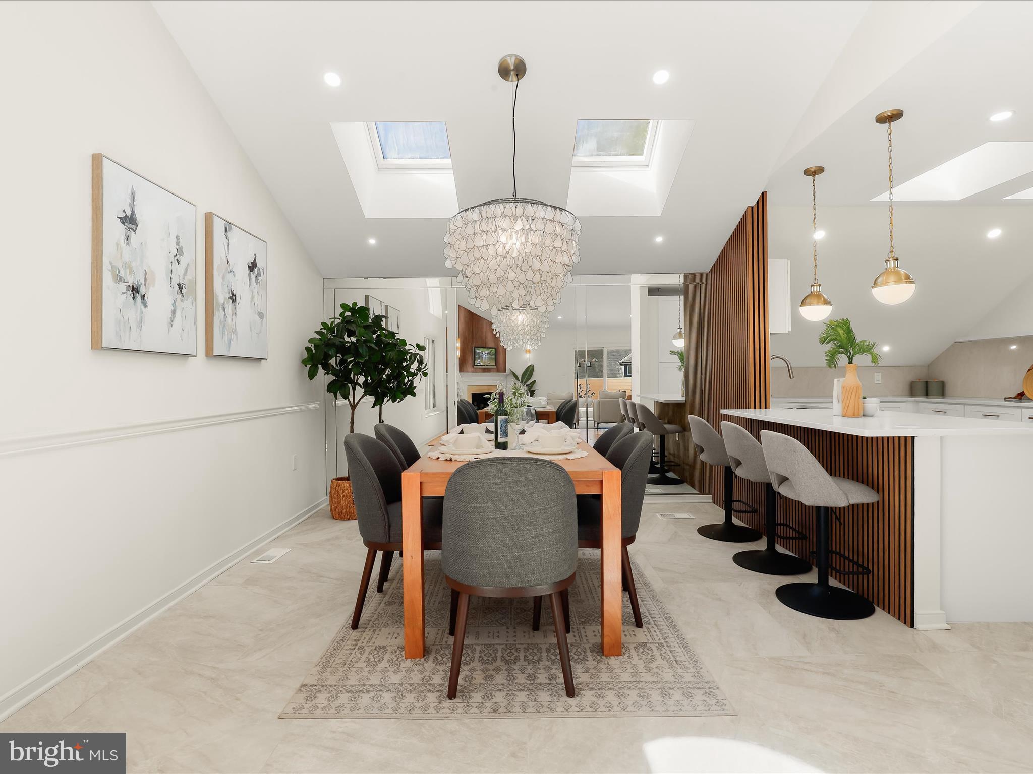 2331 Old Court Road, Unit 506 Pikesville, MD 21208 - Photo 13 of 51 a large kitchen with a table and chairs