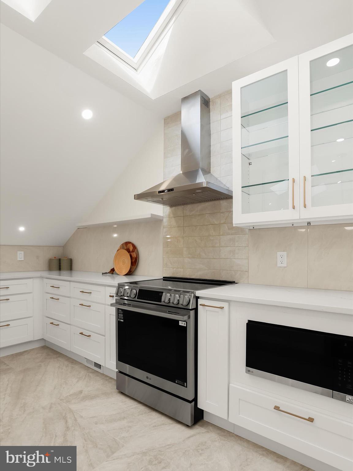 2331 Old Court Road, Unit 506 Pikesville, MD 21208 - Photo 18 of 51 a kitchen with a stove oven and cabinets
