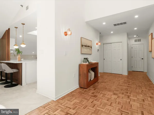 a view of a storage & utility room with two washing machine