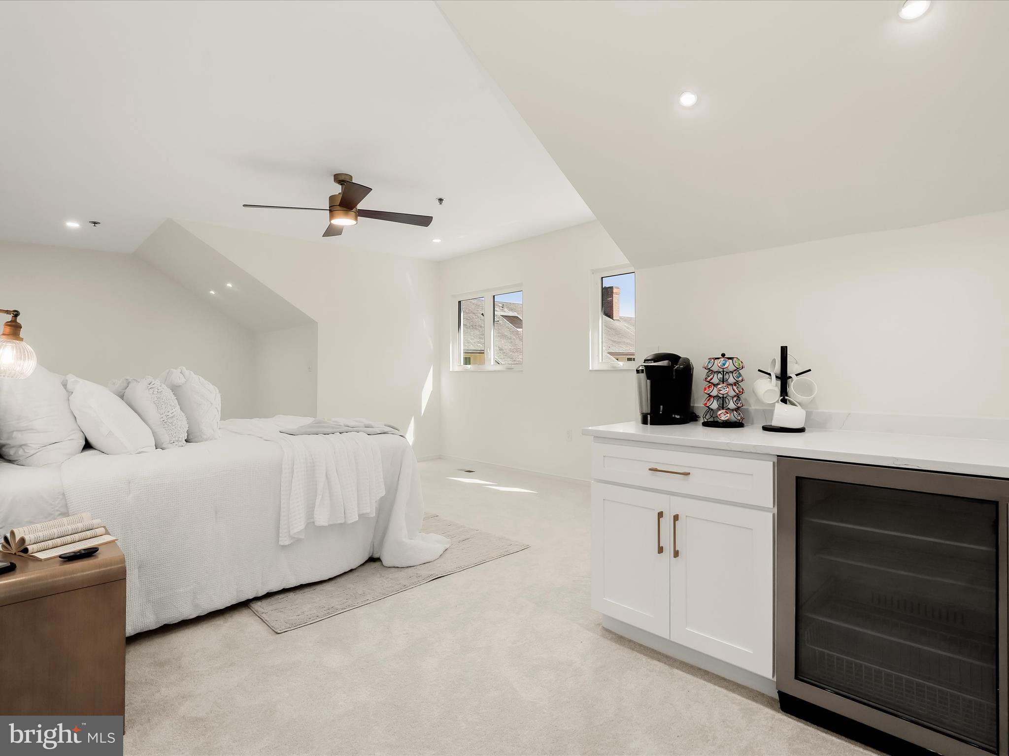 2331 Old Court Road, Unit 506 Pikesville, MD 21208 - Photo 22 of 51 a living room with furniture a chandelier and a window