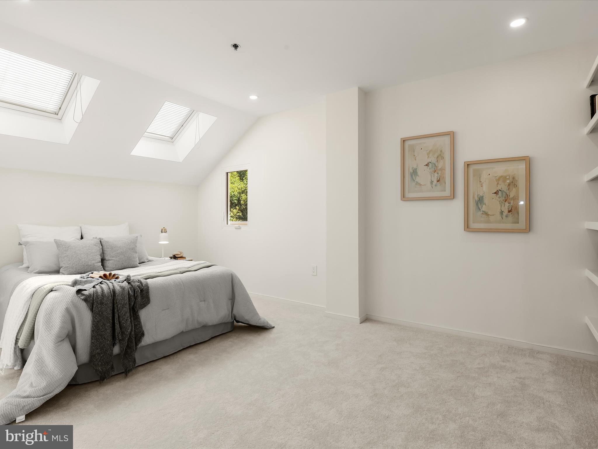 2331 Old Court Road, Unit 506 Pikesville, MD 21208 - Photo 32 of 51 a room with two bed and painting on the wall