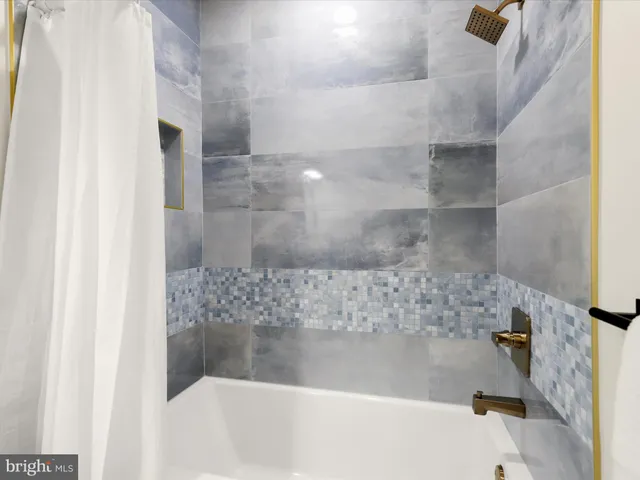 a bathroom with a bathtub
