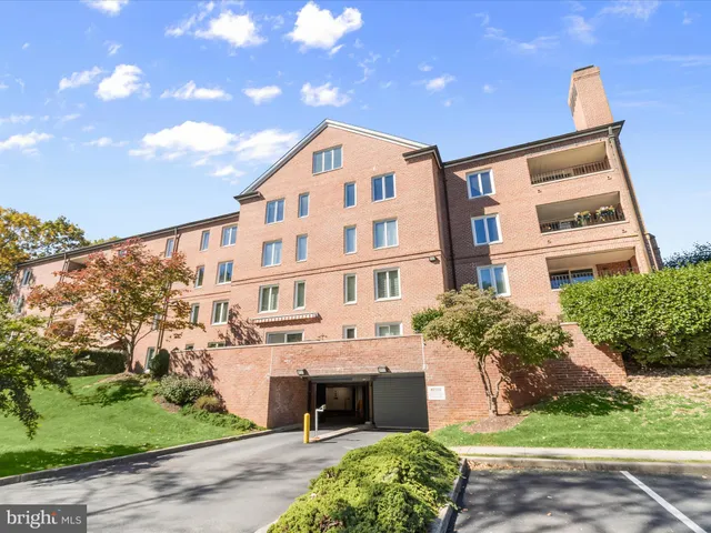 a swimming pool with outdoor seating and yard