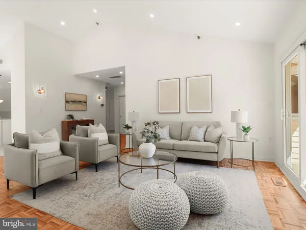 a living room with furniture and a couch