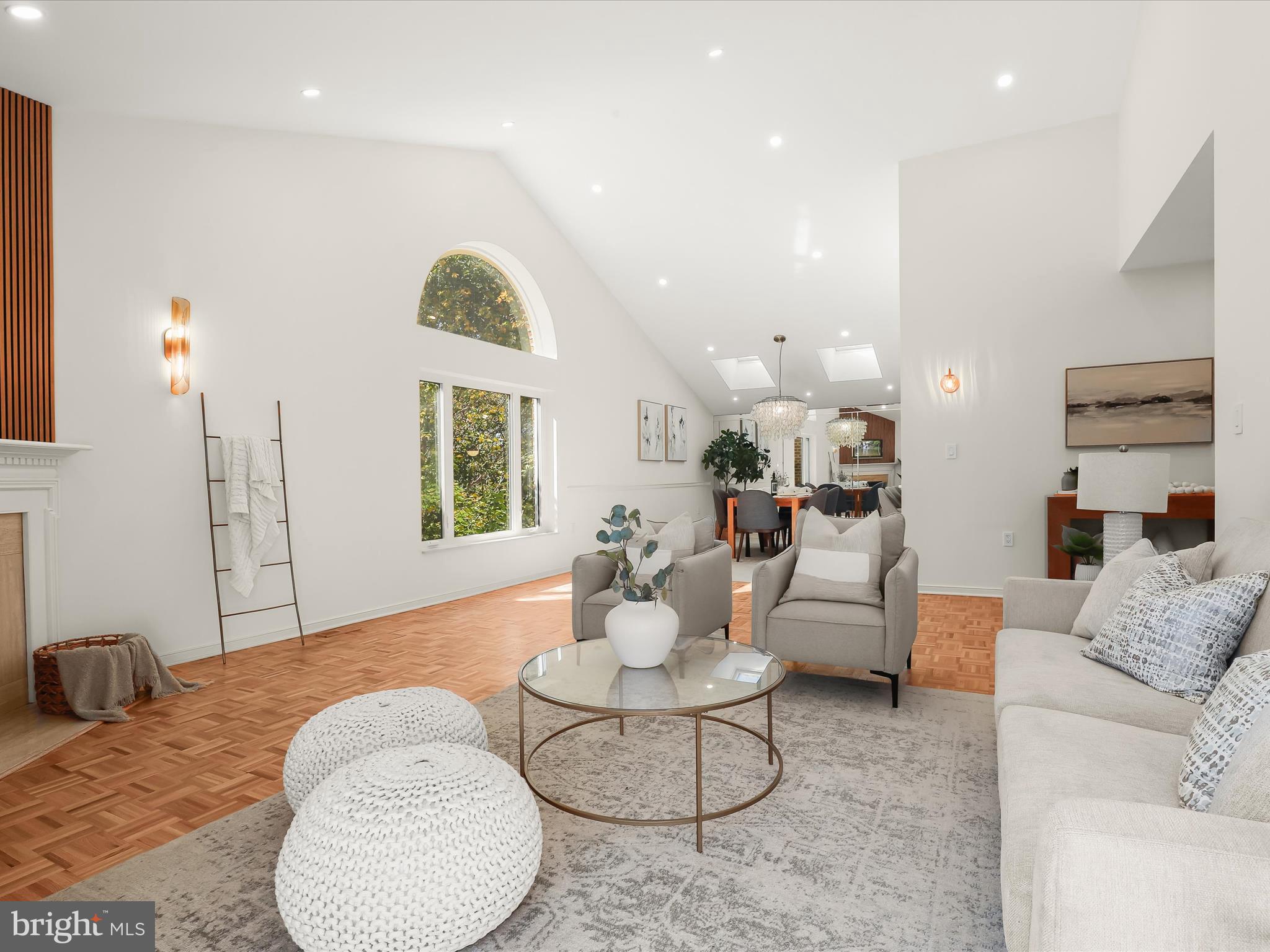 2331 Old Court Road, Unit 506 Pikesville, MD 21208 - Photo 9 of 51 a living room with furniture and a large window