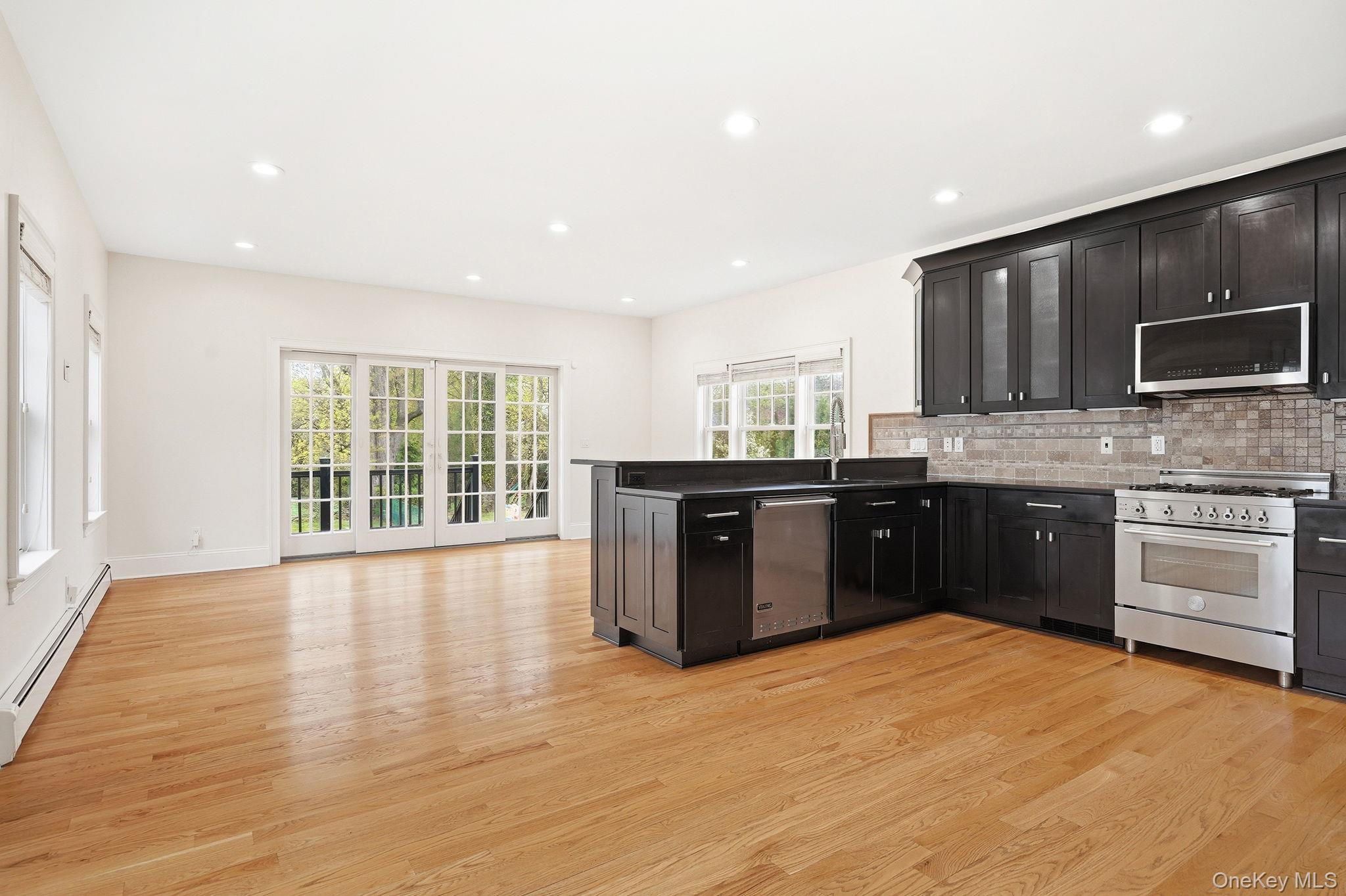 228 Central Avenue Rye, NY 10580 - Photo 6 of 24 Open Kitchen to Family Room