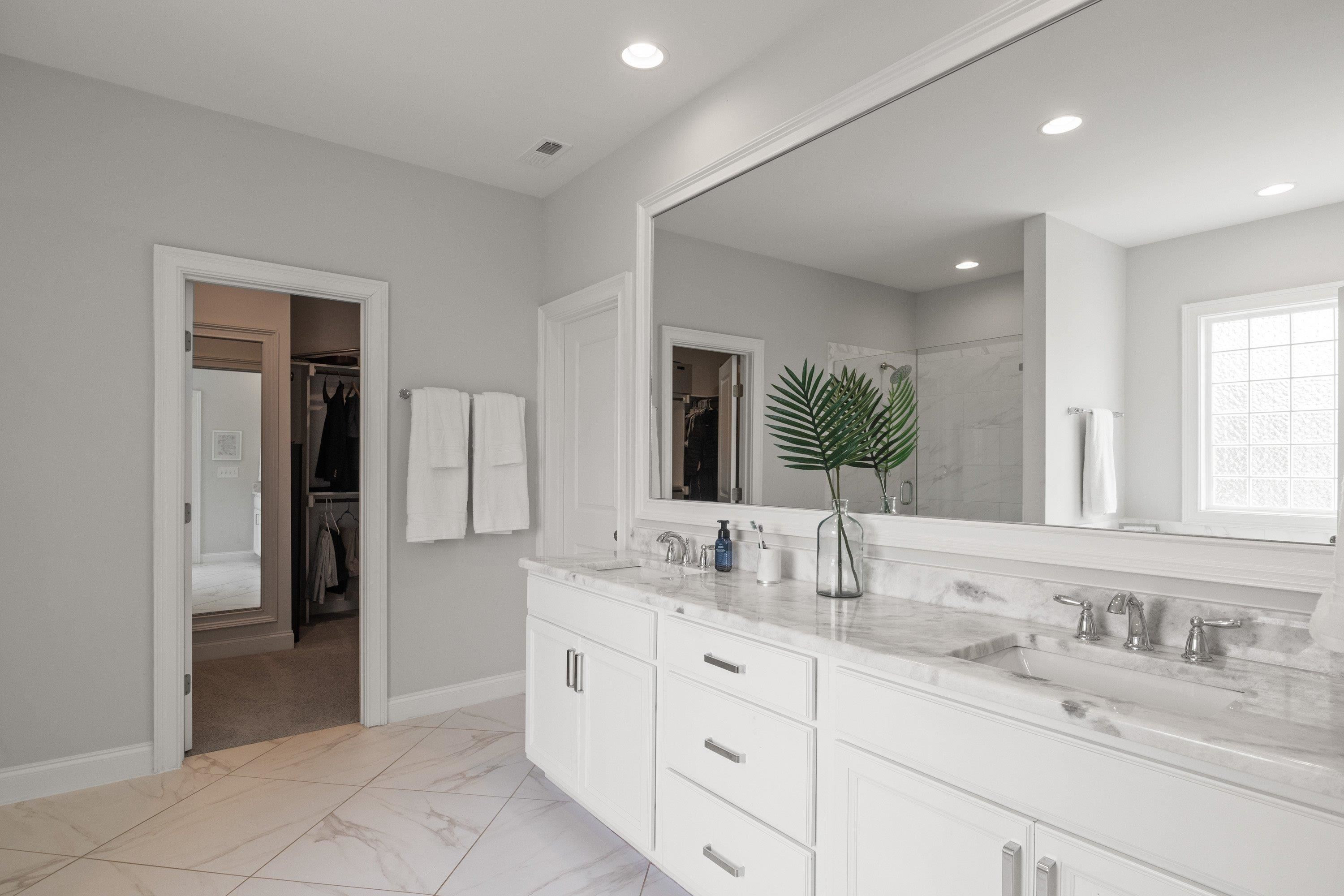 4136 Olde Judd Drive Willow Spring, NC 27592 - Photo 19 of 47 a bathroom with a granite countertop sink double and mirror