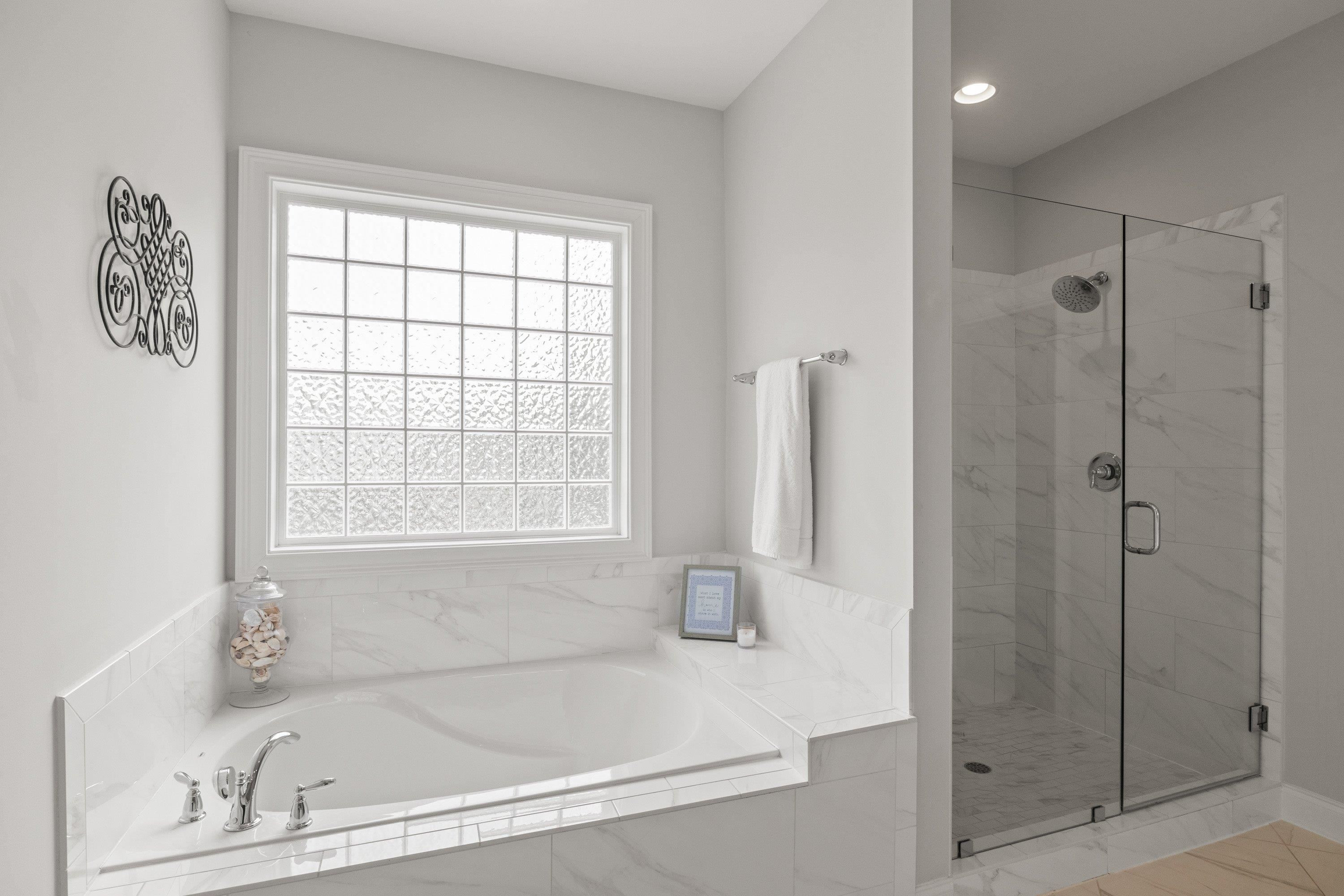 4136 Olde Judd Drive Willow Spring, NC 27592 - Photo 20 of 47 a white bath tub sitting next to a window