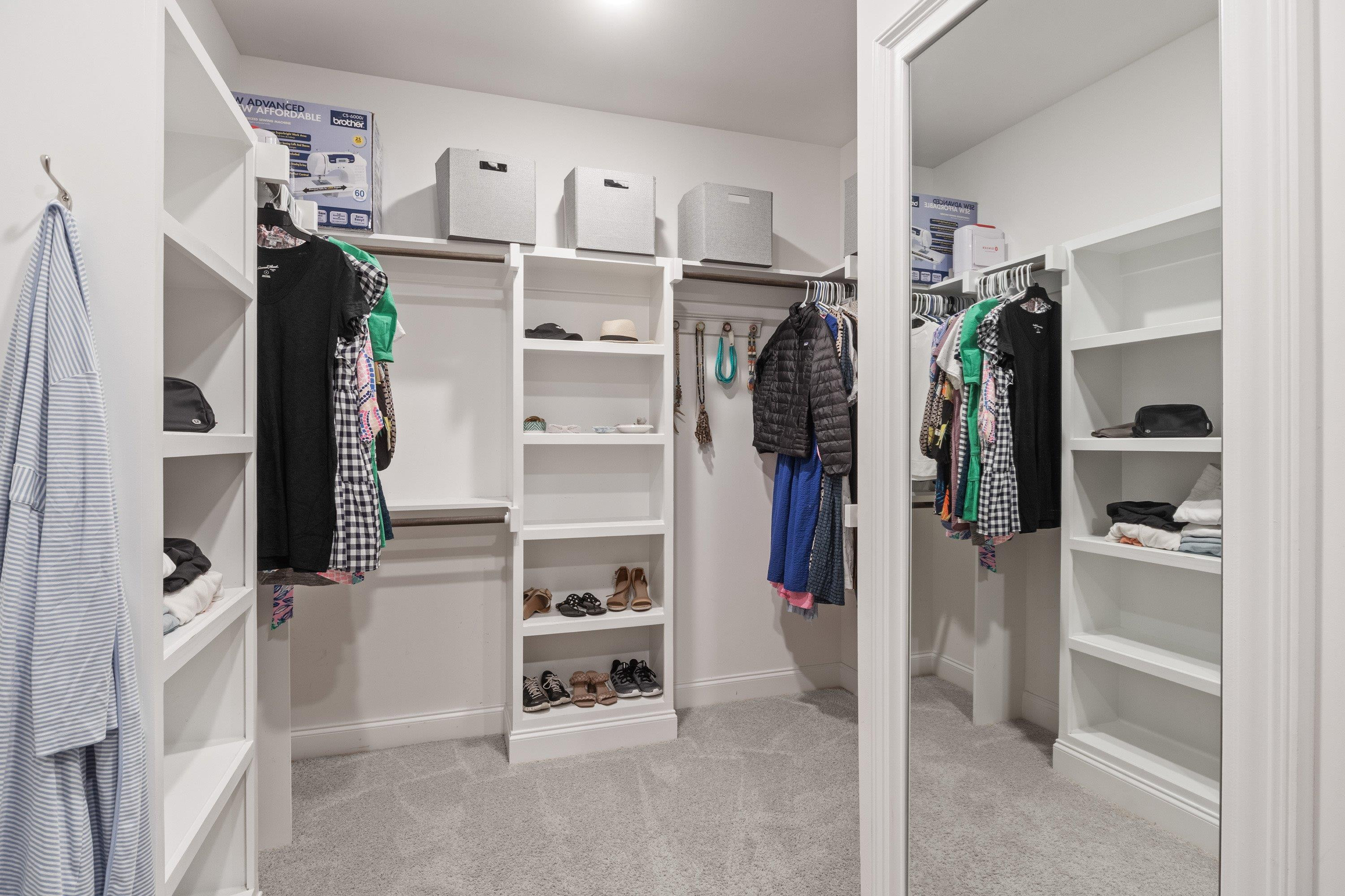 4136 Olde Judd Drive Willow Spring, NC 27592 - Photo 22 of 47 a view of a walk in closet and kitchen