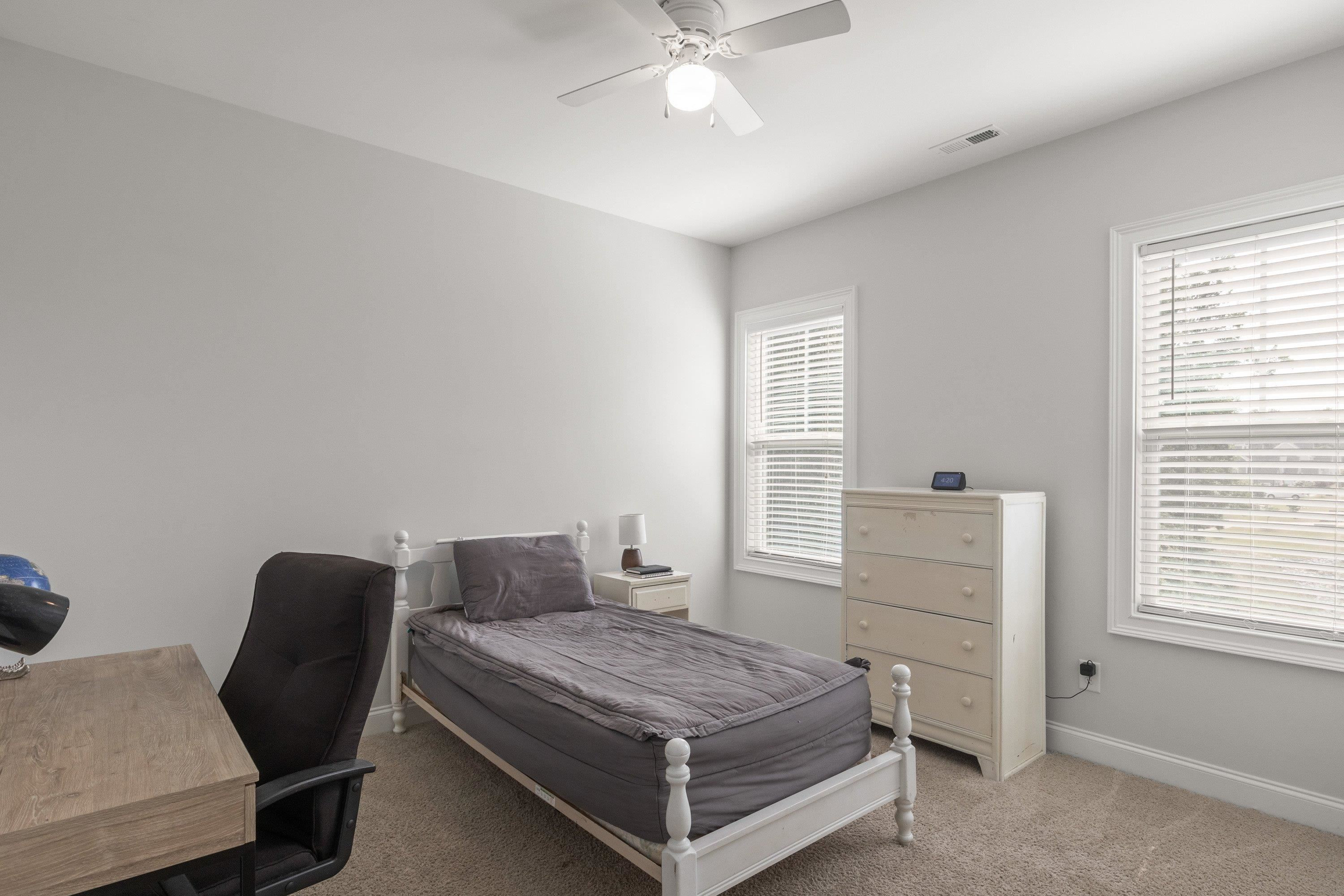 4136 Olde Judd Drive Willow Spring, NC 27592 - Photo 31 of 47 a bedroom with a bed and window