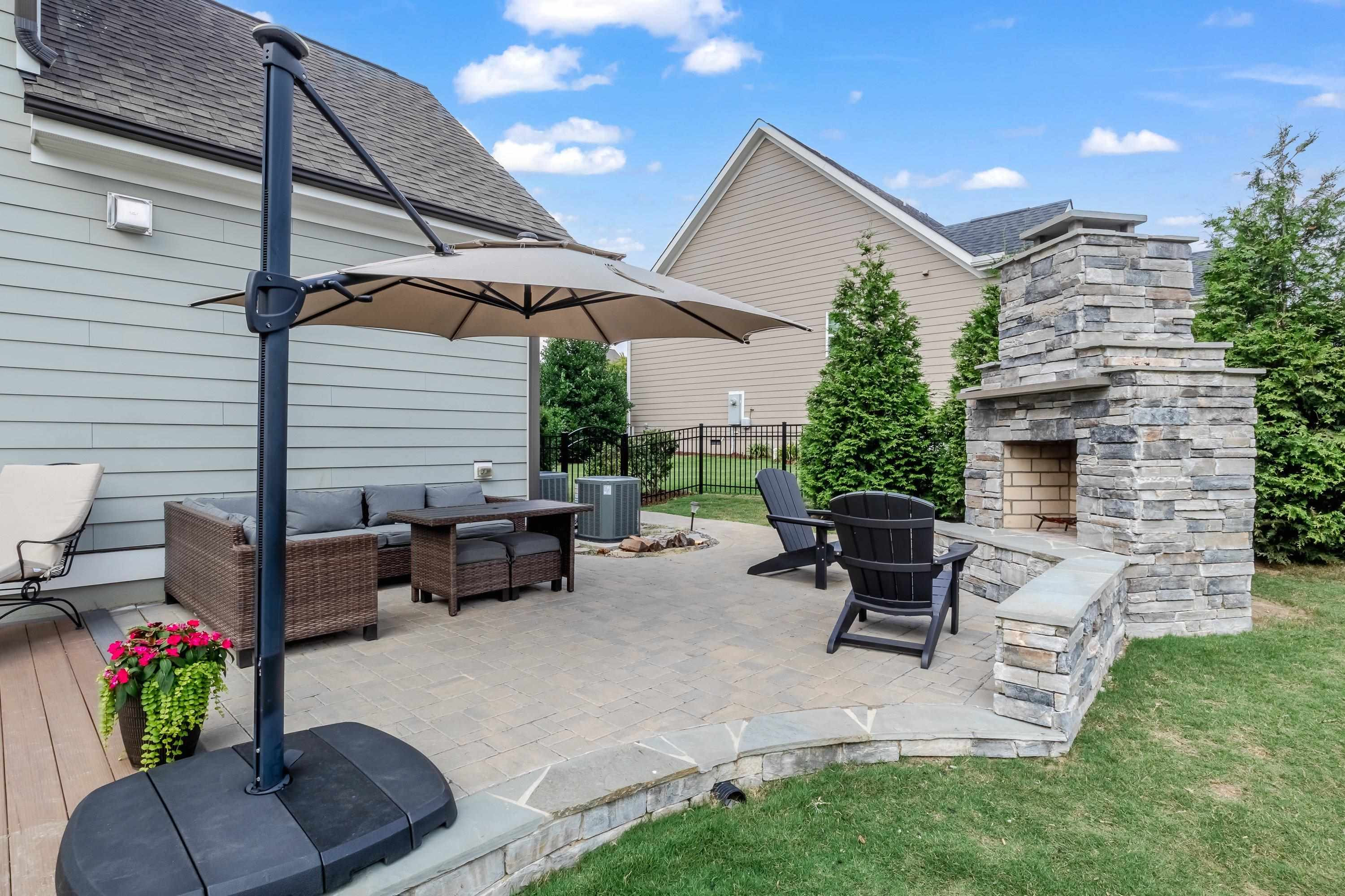 4136 Olde Judd Drive Willow Spring, NC 27592 - Photo 38 of 47 a backyard of a house with seating space