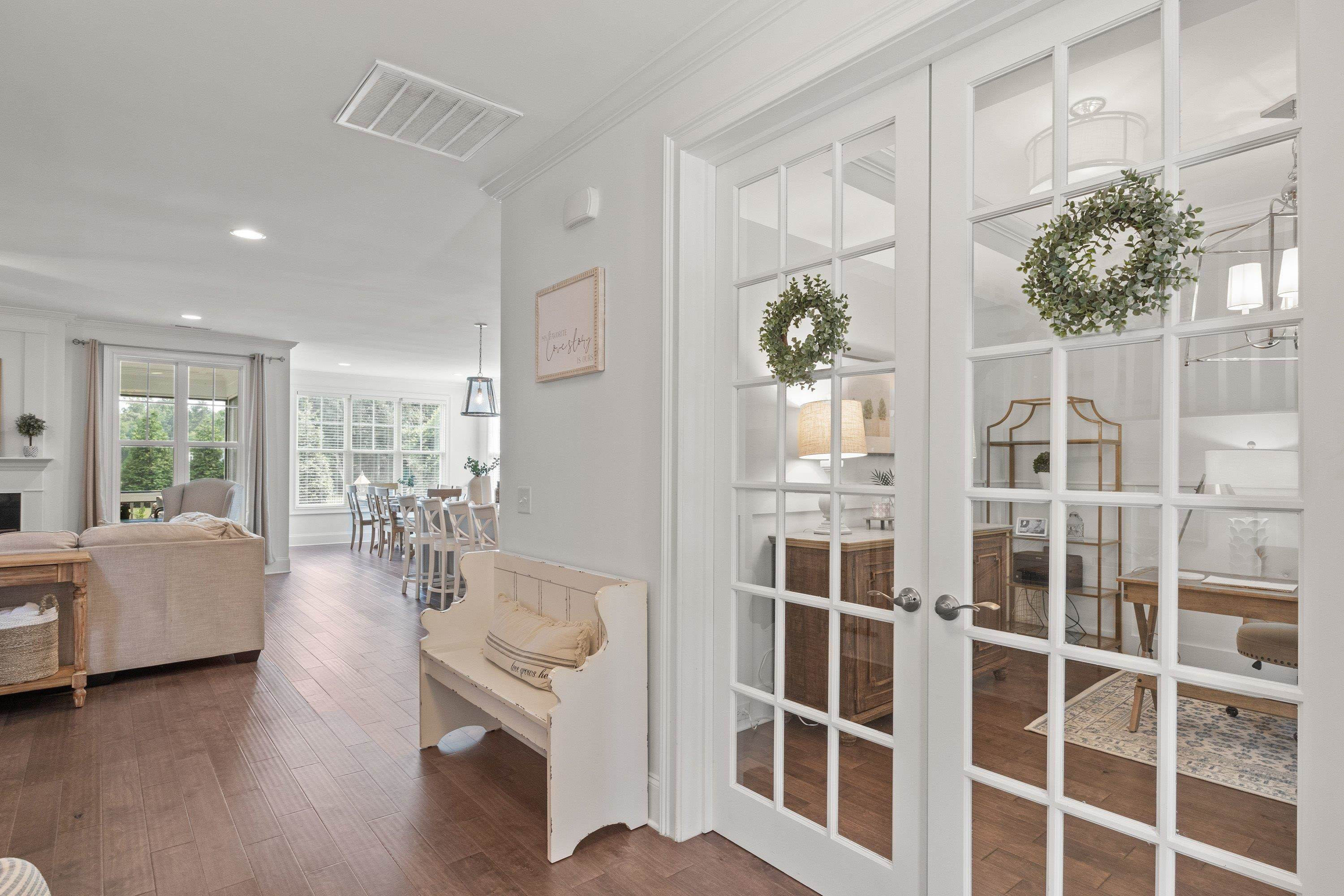 4136 Olde Judd Drive Willow Spring, NC 27592 - Photo 8 of 47 a living room with furniture and a large window