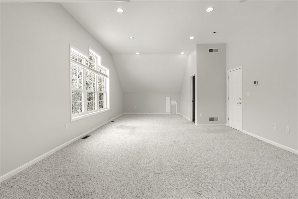 95 Wright Road Hollis, NH 03049 - Photo 21 of 42 an empty room with windows and closet