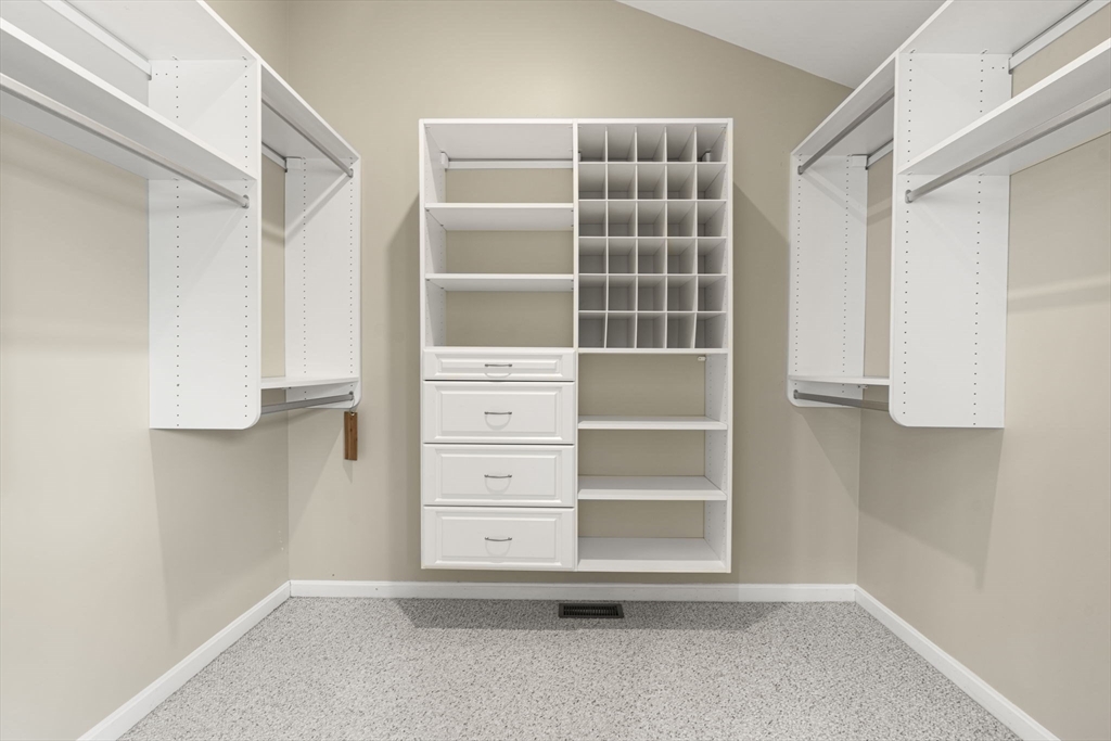 95 Wright Road Hollis, NH 03049 - Photo 25 of 42 a view of walk in closet with empty racks