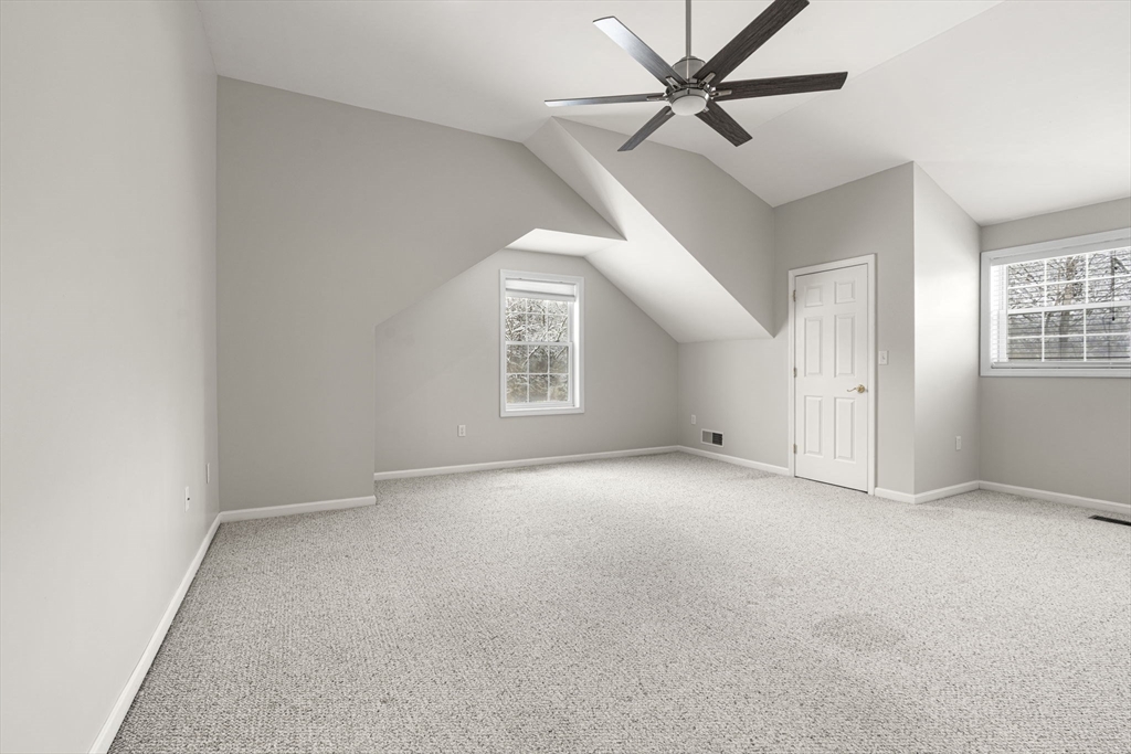 95 Wright Road Hollis, NH 03049 - Photo 27 of 42 an empty room with windows and fan