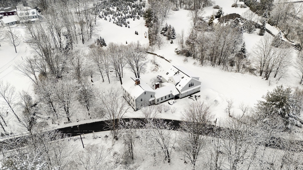 95 Wright Road Hollis, NH 03049 - Photo 3 of 42 a view of snow on the road