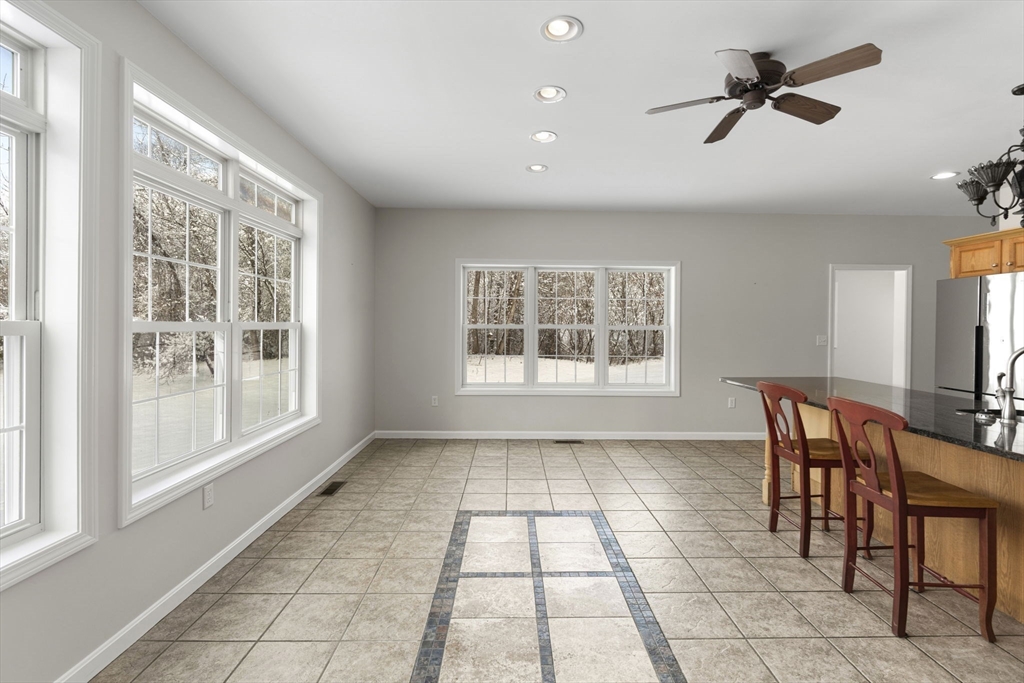 95 Wright Road Hollis, NH 03049 - Photo 9 of 42 a view of a dining room with furniture window and outside view