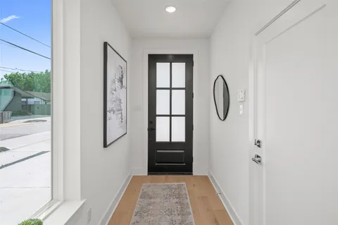 a view of a hallway with entryway