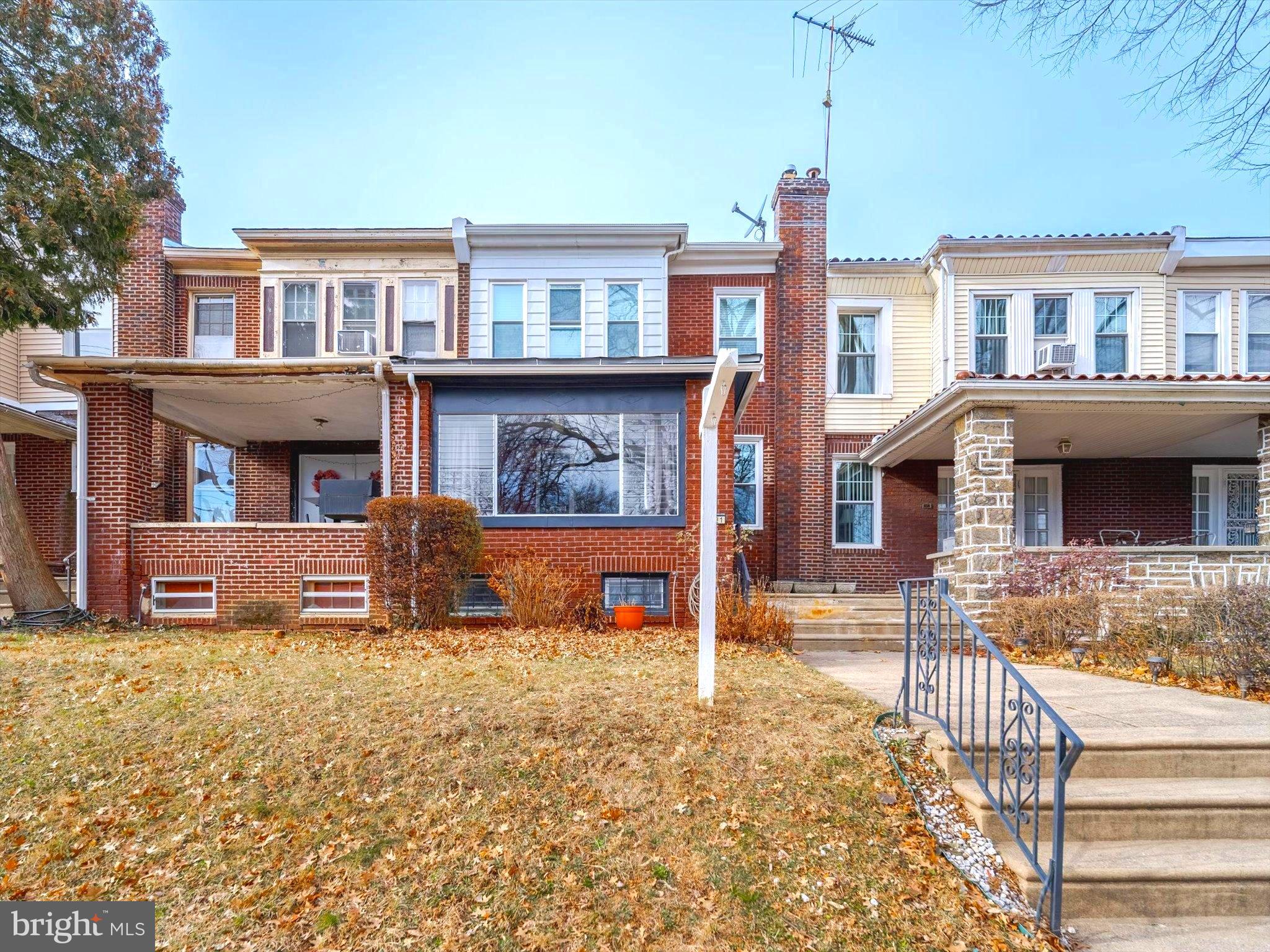 321 East Phil Ellena Street Philadelphia, PA 19119 - Photo 3 of 39 Charming brick facade with inviting steps.