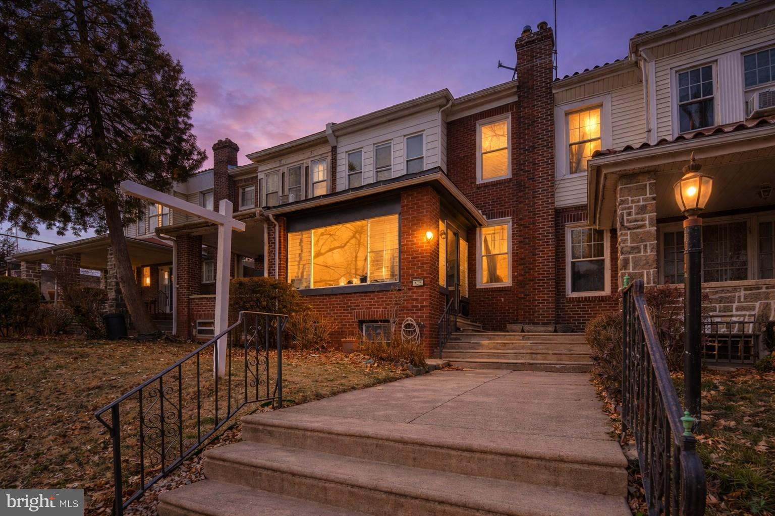 321 East Phil Ellena Street Philadelphia, PA 19119 - Photo 5 of 39 Charming home aglow at twilight's embrace.