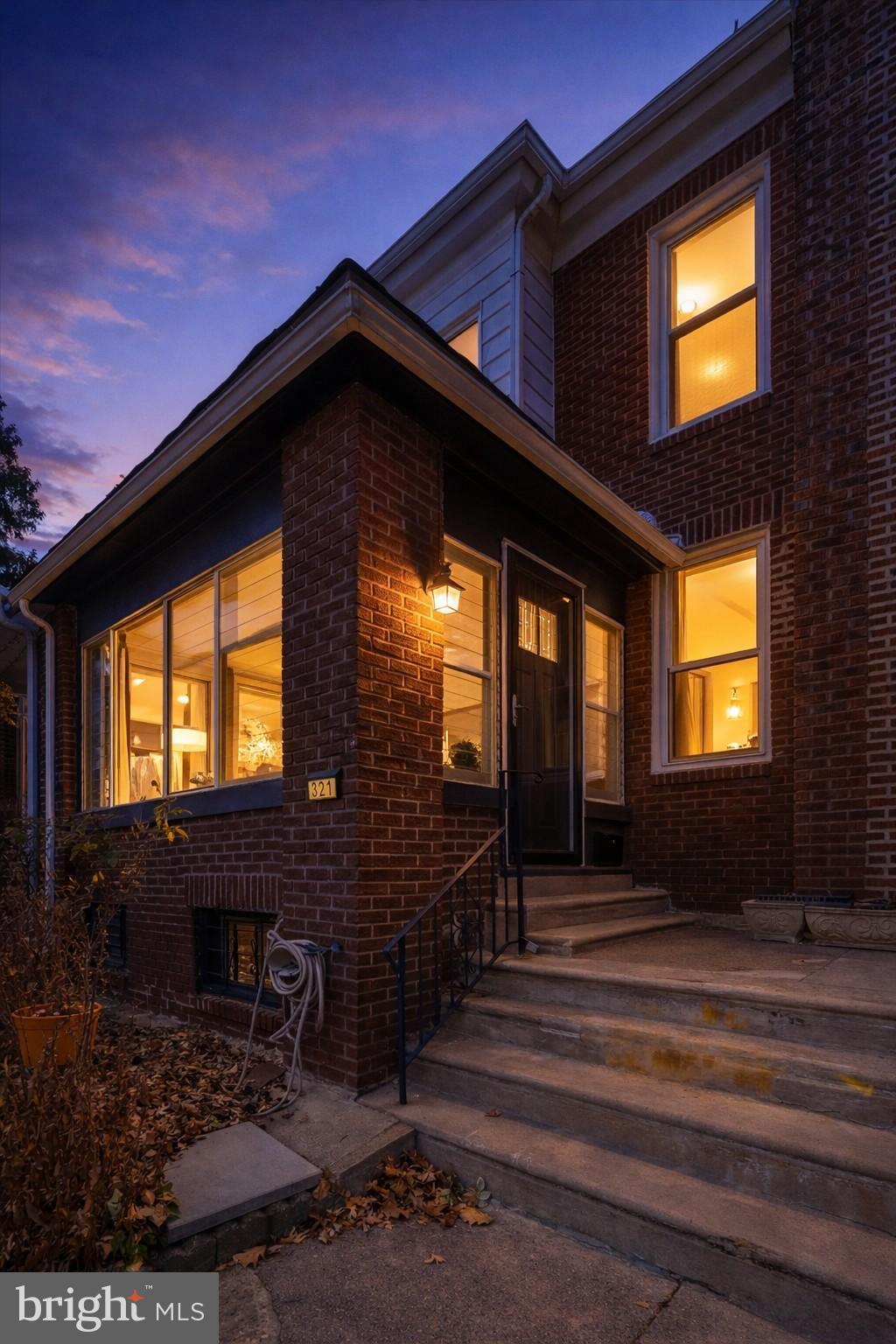 321 East Phil Ellena Street Philadelphia, PA 19119 - Photo 6 of 39 Charming brick home at twilight glow.