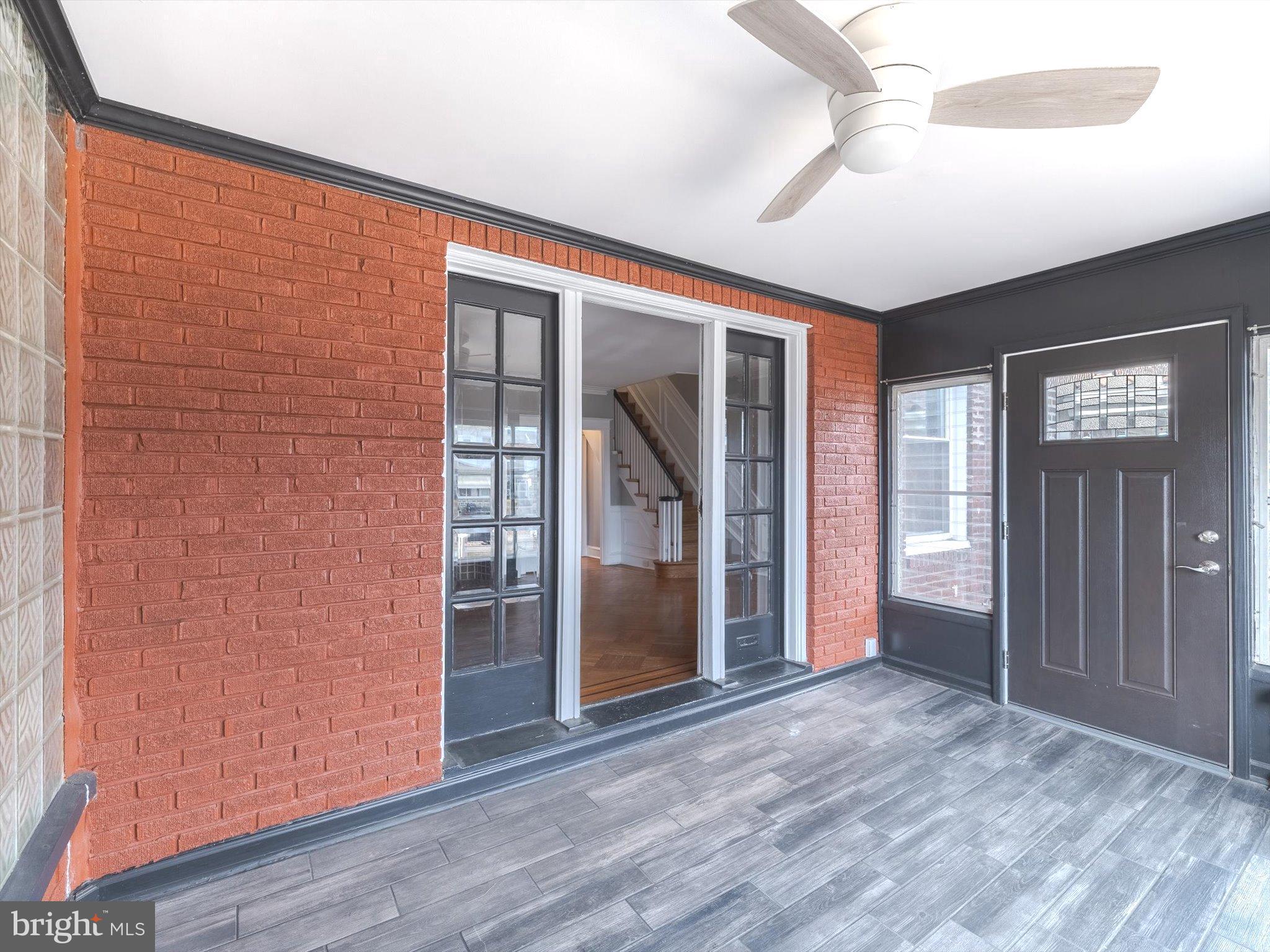 321 East Phil Ellena Street Philadelphia, PA 19119 - Photo 9 of 39 Charming entryway with bold brick accents.