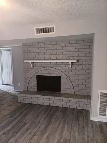 a living room with a fireplace