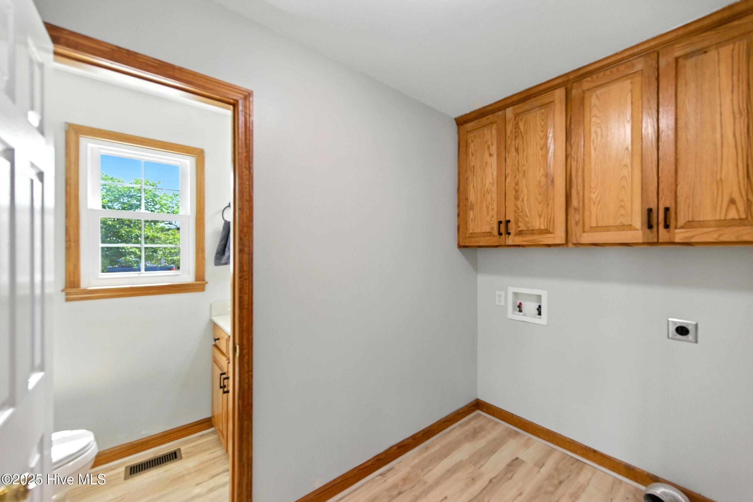 150 South Mill Dam Road Camden, NC 27921 - Photo 27 of 42 Laundry Area/ Half Bathroom