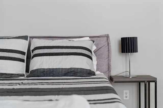 a view of staircase with white walls