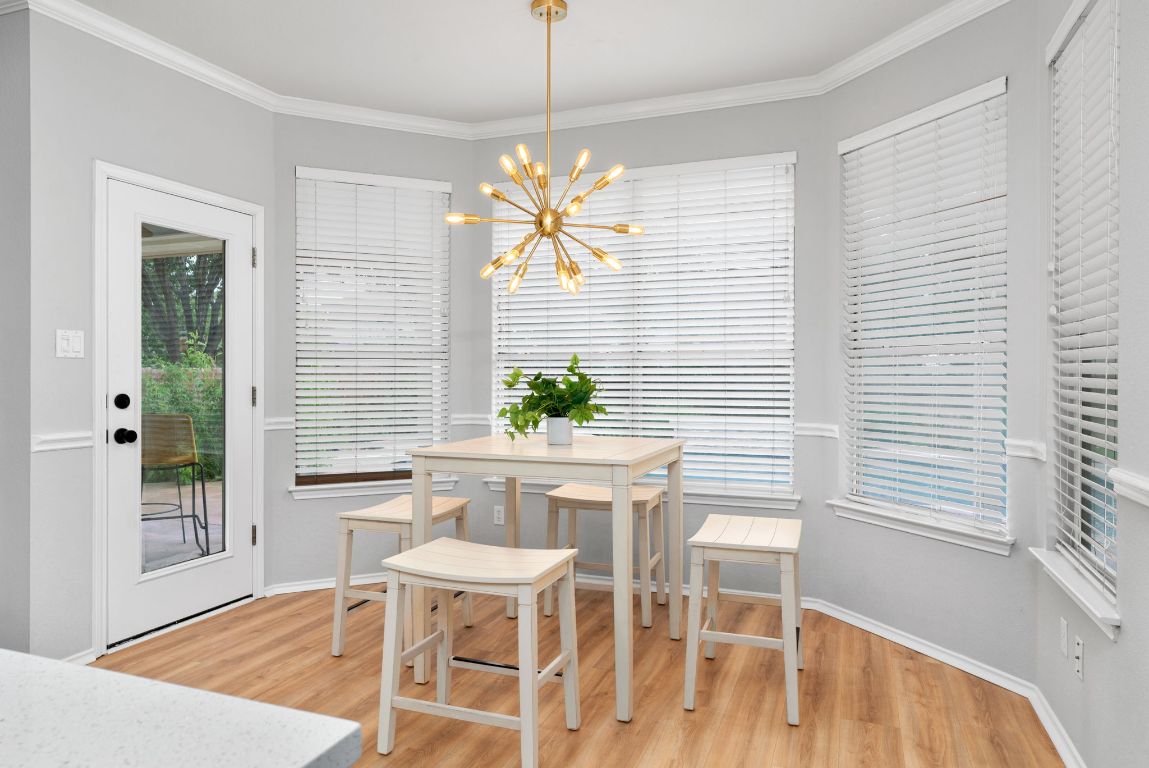 807 Clarence Bohl Pflugerville, TX 78660 - Photo 10 of 40 a dining room with furniture and window
