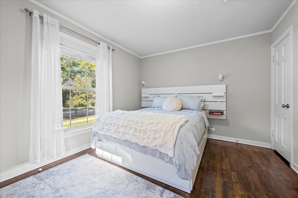 1425 Brophy Avenue Park Ridge, IL 60068 - Photo 12 of 24 a bedroom with a bed and a window