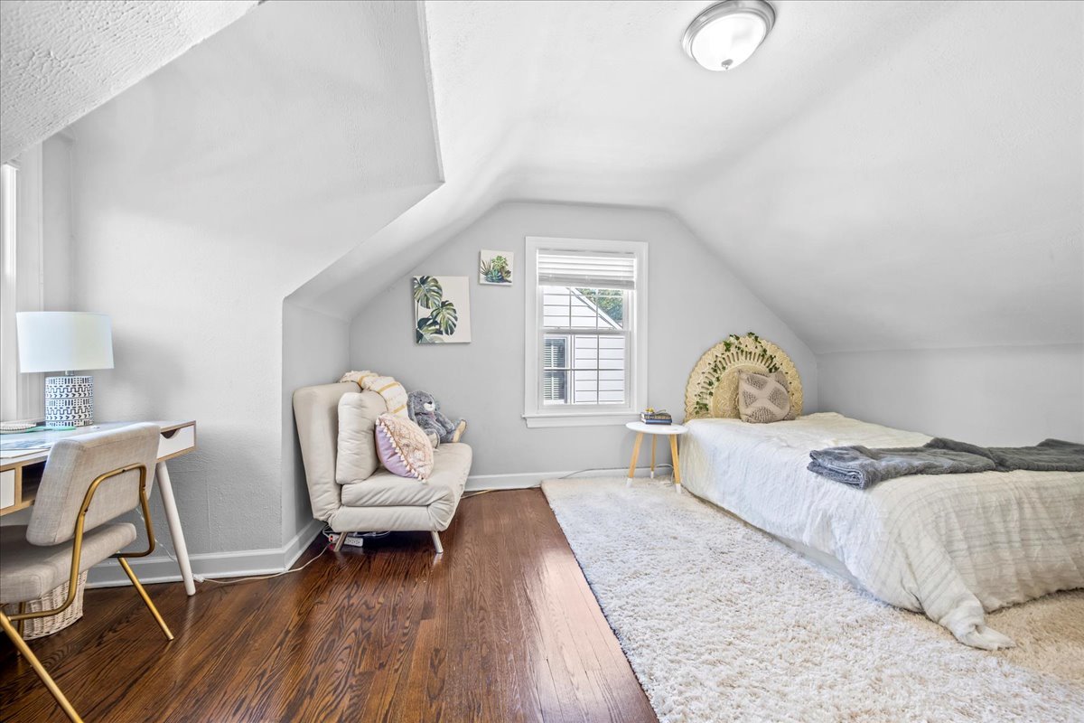1425 Brophy Avenue Park Ridge, IL 60068 - Photo 14 of 24 a bedroom with a bed and wooden floor