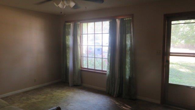 325 Dean Road Clarksville, TN 37040 - Photo 2 of 11 an empty room with windows