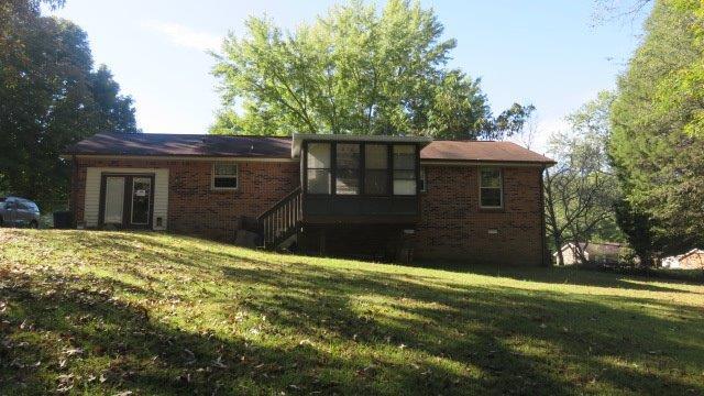 325 Dean Road Clarksville, TN 37040 - Photo 7 of 11 a view of a house with a yard