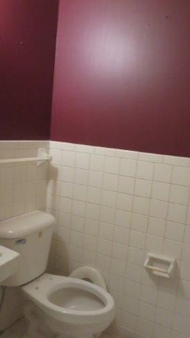 325 Dean Road Clarksville, TN 37040 - Photo 9 of 11 a white toilet sitting next to a white wall