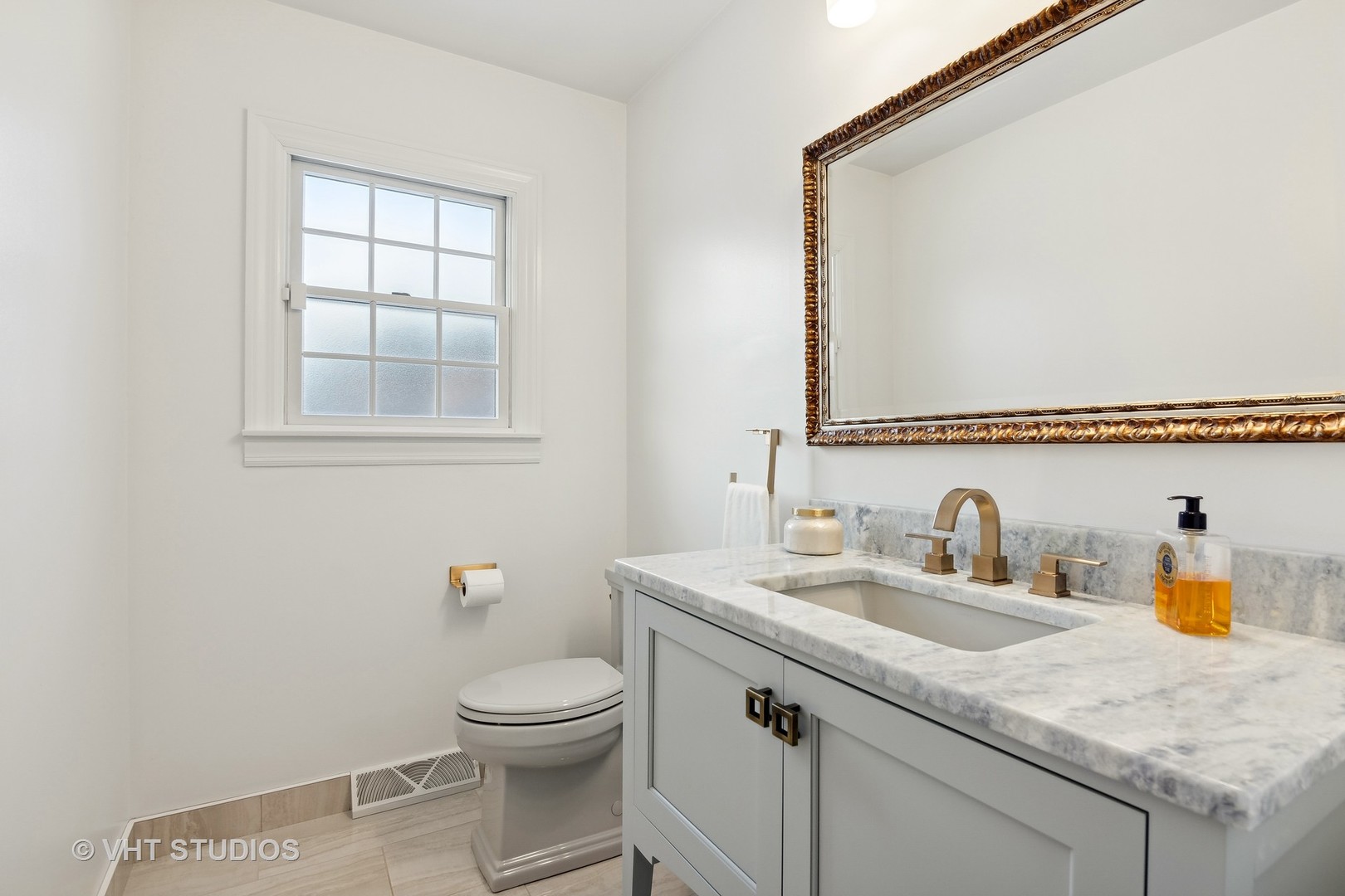 68 Citation Circle Wheaton, IL 60189 - Photo 18 of 38 a bathroom with a granite countertop sink toilet and mirror