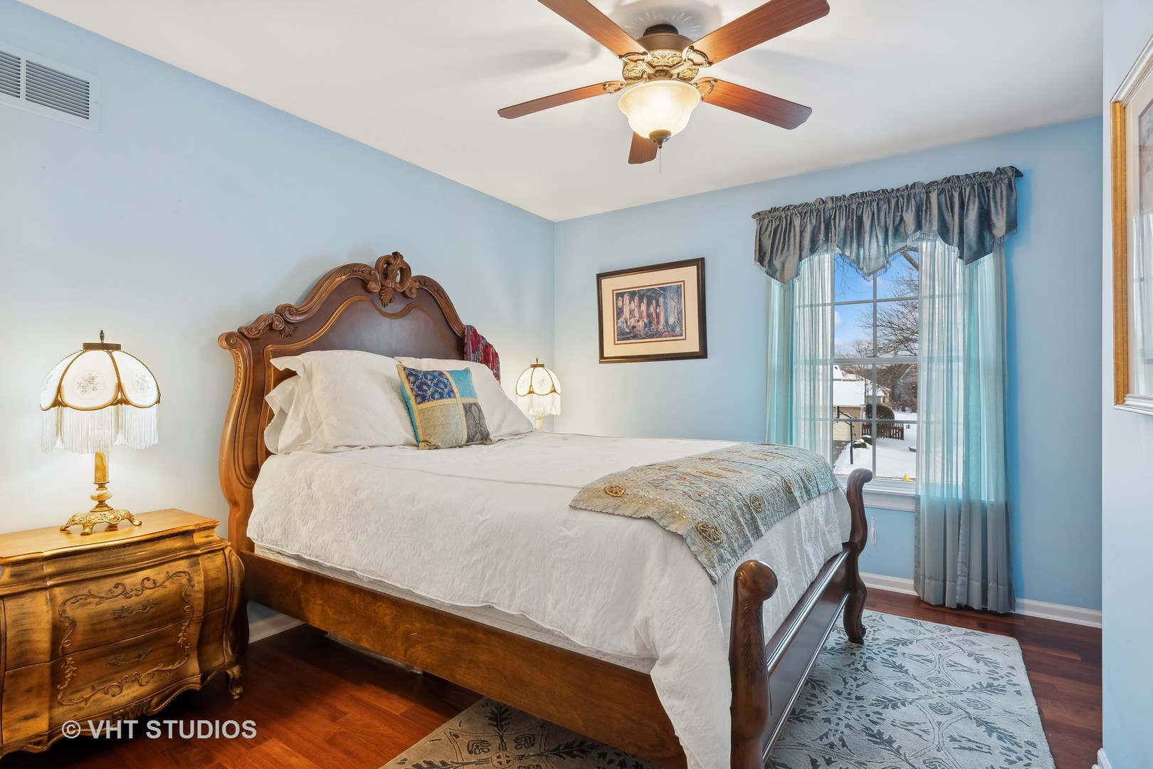 68 Citation Circle Wheaton, IL 60189 - Photo 27 of 38 a bedroom with a bed and a chandelier
