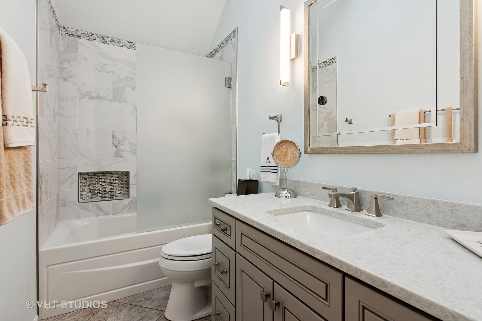 68 Citation Circle Wheaton, IL 60189 - Photo 28 of 38 a bathroom with a sink a toilet and shower