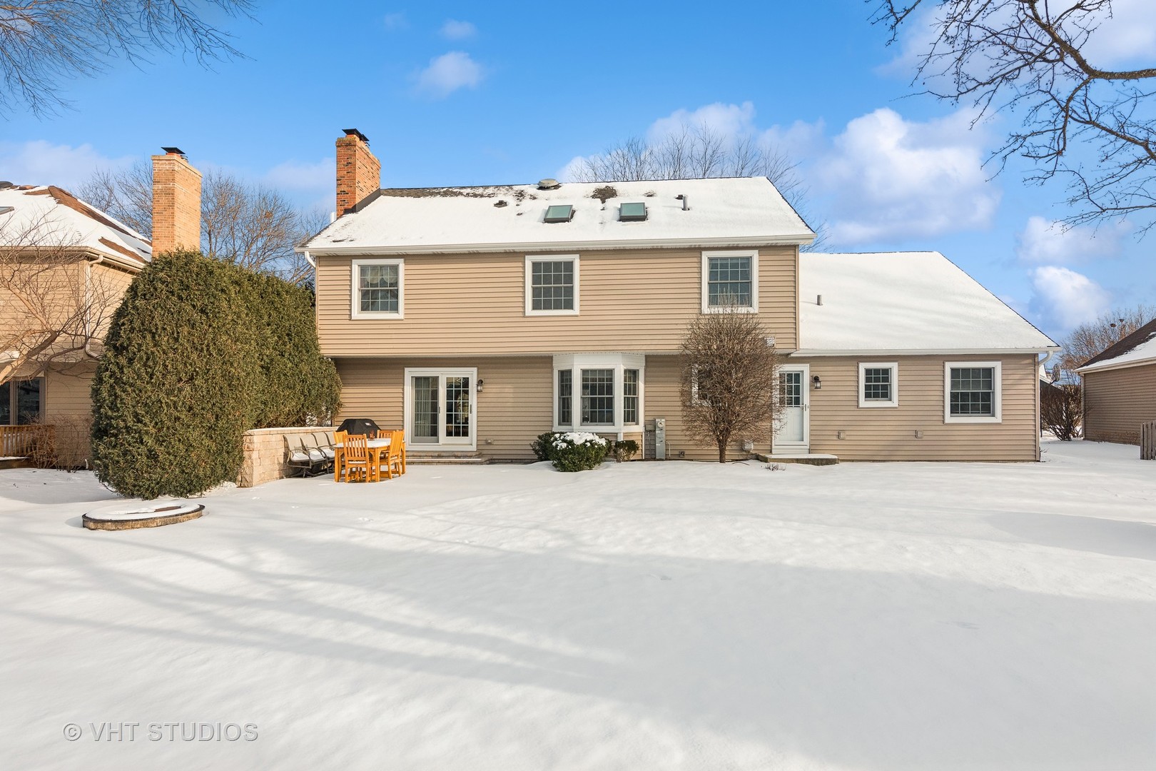 68 Citation Circle Wheaton, IL 60189 - Photo 33 of 38 a view of a house with a patio